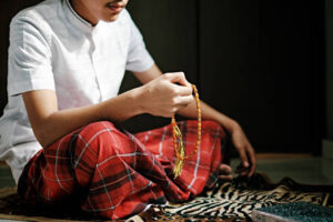 Portrait of Islam Man Praying during Ramadan - stock photo